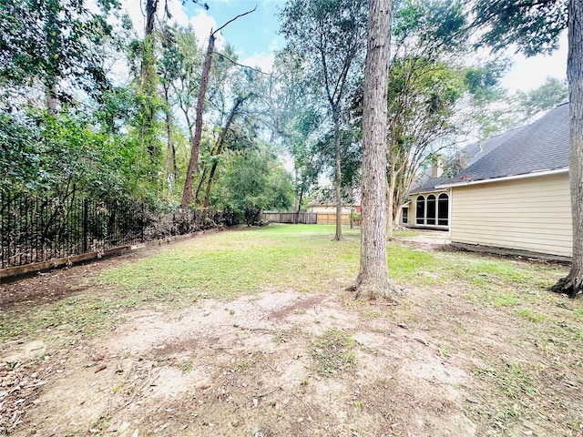 view of yard featuring fence