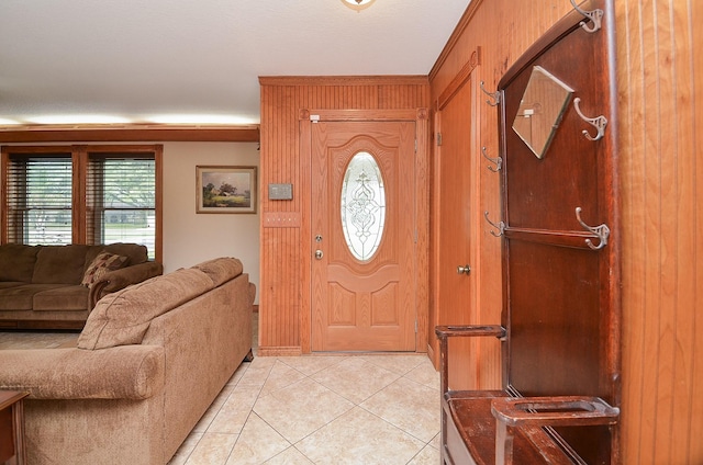 foyer entrance with light tile patterned floors