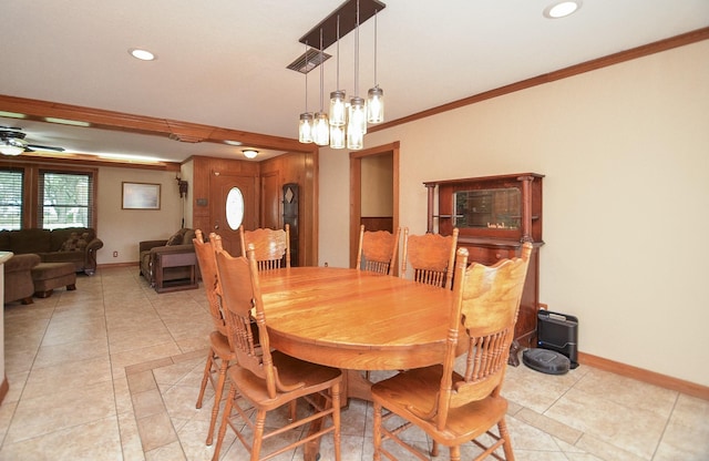 dining room with light tile patterned floors, ornamental molding, recessed lighting, and baseboards