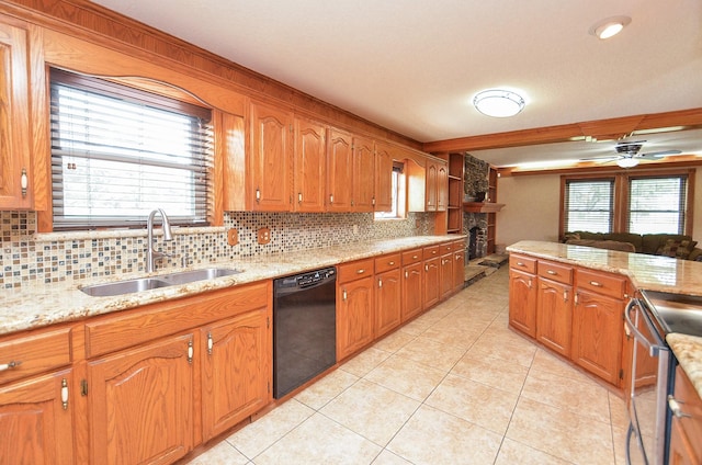 kitchen featuring a sink, electric stove, brown cabinets, dishwasher, and tasteful backsplash