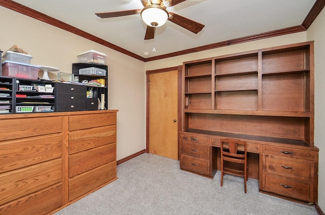 office area featuring ceiling fan, ornamental molding, baseboards, and light colored carpet