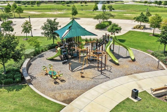 communal playground with a lawn