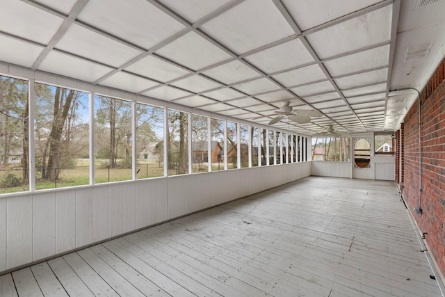 unfurnished sunroom with plenty of natural light