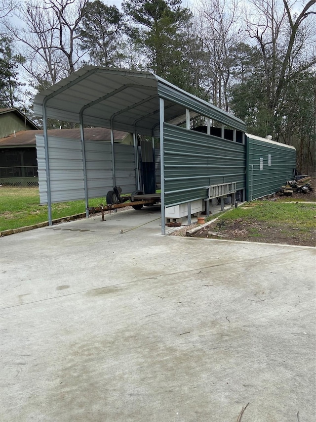 view of car parking featuring a carport and concrete driveway