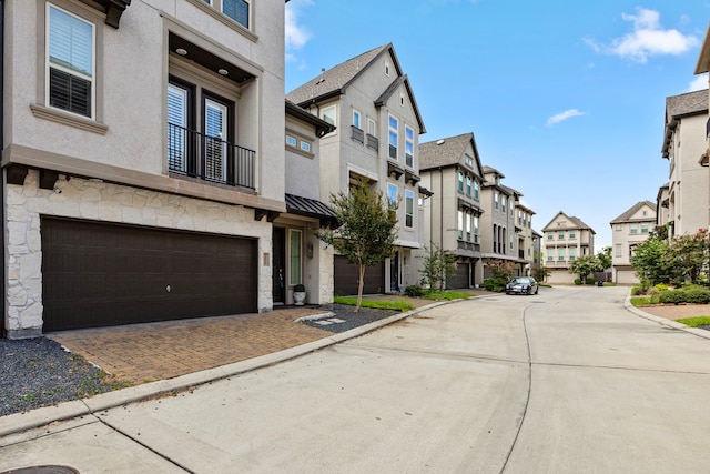 view of road with a residential view and curbs