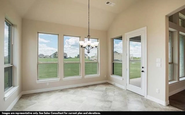 719 Woodbinde Dr, League City, TX 77573 - unfurnished dining area with lofted ceiling, visible vents, plenty of natural light, and baseboards