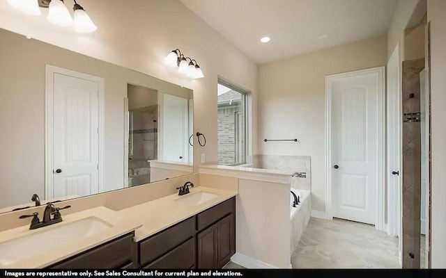 719 Woodbinde Dr, League City, TX 77573 - full bath featuring double vanity, a garden tub, a sink, and tiled shower