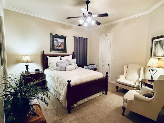 bedroom with carpet, ornamental molding, and ceiling fan