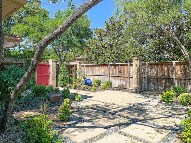 exterior space featuring a fenced backyard