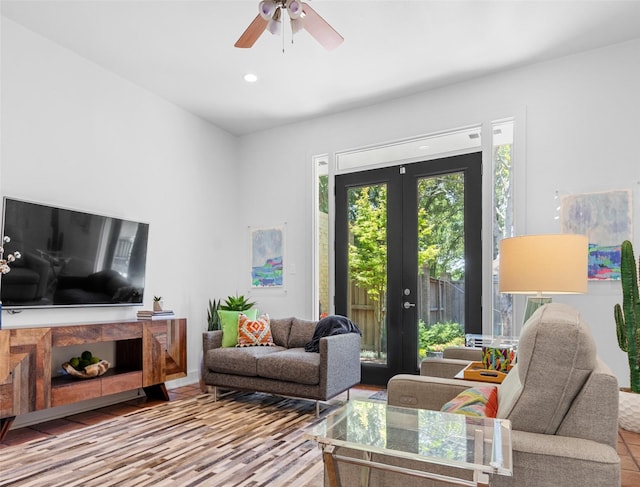 living room with french doors, wood finished floors, a ceiling fan, and recessed lighting