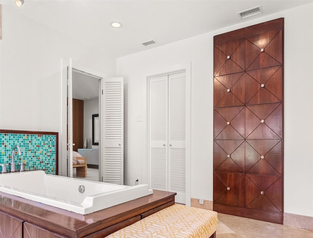 bathroom featuring recessed lighting, tile patterned flooring, and visible vents