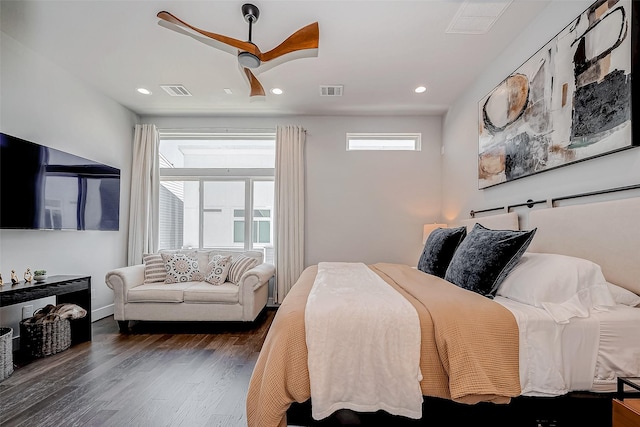 bedroom with dark wood-style floors, ceiling fan, multiple windows, and recessed lighting