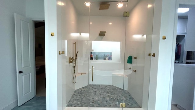 full bathroom with a stall shower and a garden tub