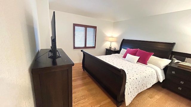 bedroom featuring light wood-style flooring