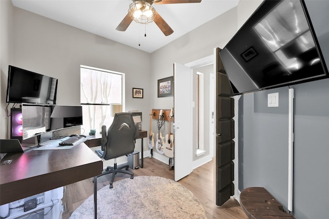 office area with ceiling fan and light wood finished floors