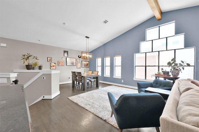 living area with high vaulted ceiling, visible vents, beam ceiling, dark wood finished floors, and an inviting chandelier