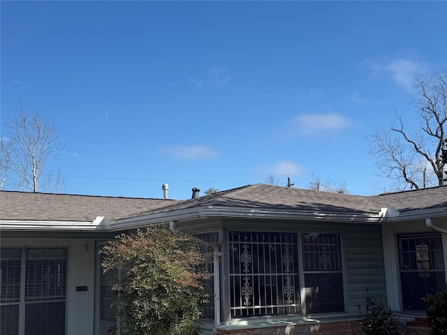 view of home's exterior featuring a shingled roof