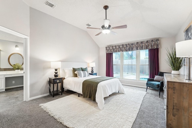 bedroom featuring lofted ceiling, baseboards, visible vents, and light colored carpet