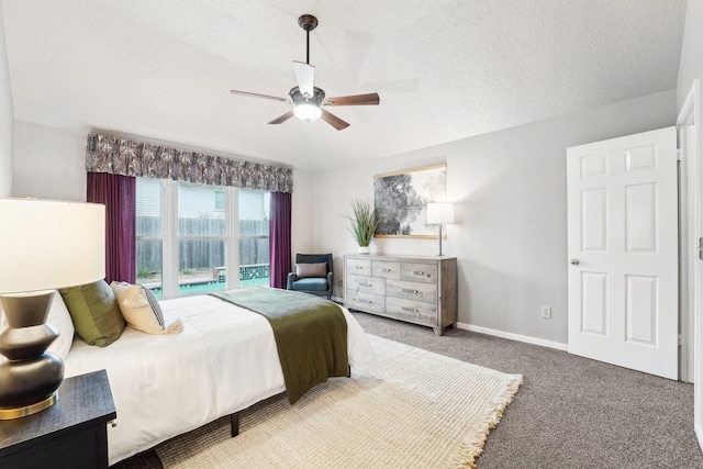 bedroom with carpet flooring, ceiling fan, a textured ceiling, and baseboards