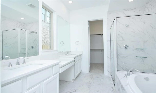 full bath with marble finish floor, a marble finish shower, visible vents, vanity, and a bath