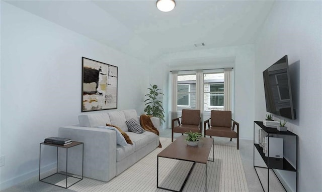 living room with visible vents and baseboards