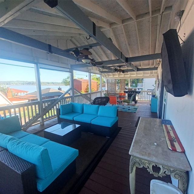 wooden deck with outdoor dining space, outdoor lounge area, and ceiling fan