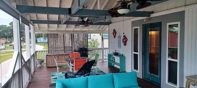 sunroom / solarium with ceiling fan