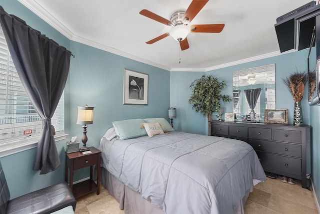 bedroom featuring ceiling fan and crown molding