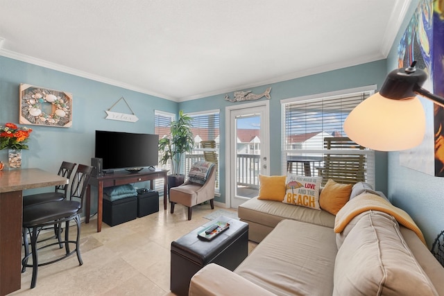 living area with light tile patterned floors and ornamental molding