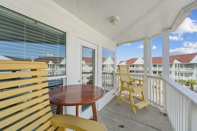 balcony featuring a sunroom