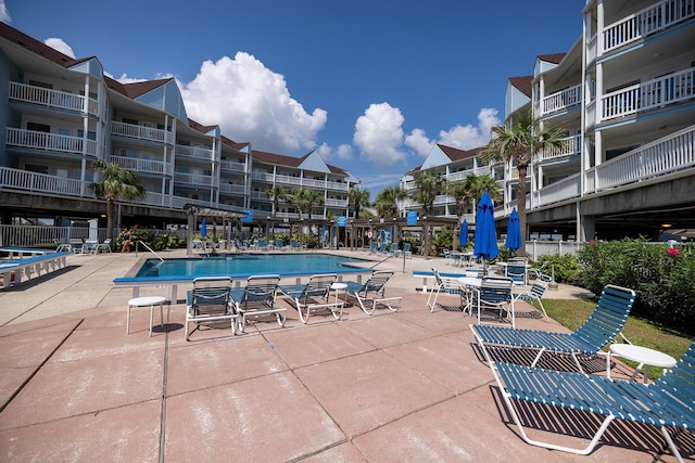 pool with a patio