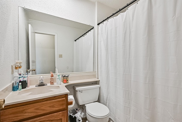 full bath with vanity and toilet