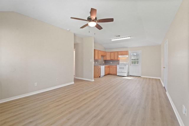 kitchen featuring open floor plan, light countertops, white appliances, and under cabinet range hood