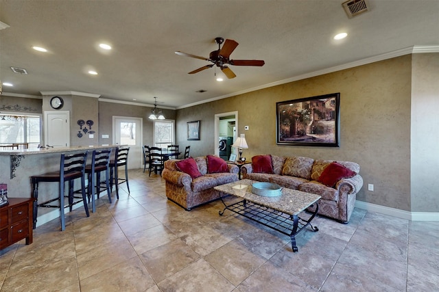 living area with baseboards, recessed lighting, visible vents, and a ceiling fan