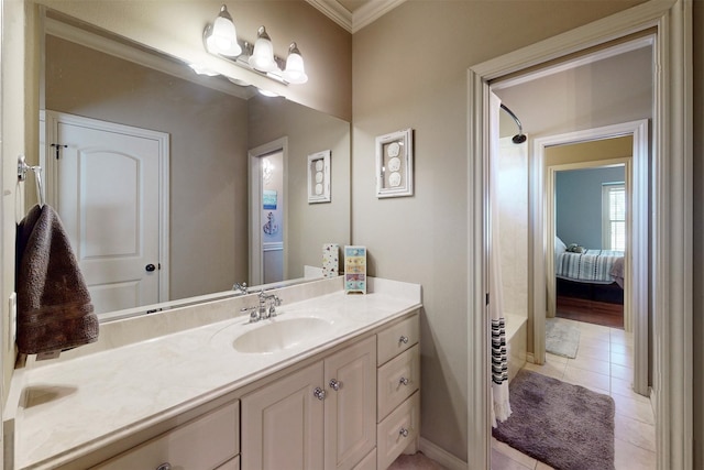 bathroom featuring crown molding, connected bathroom, vanity, and tile patterned floors