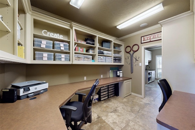 home office featuring ornamental molding, light tile patterned flooring, built in desk, and a textured ceiling