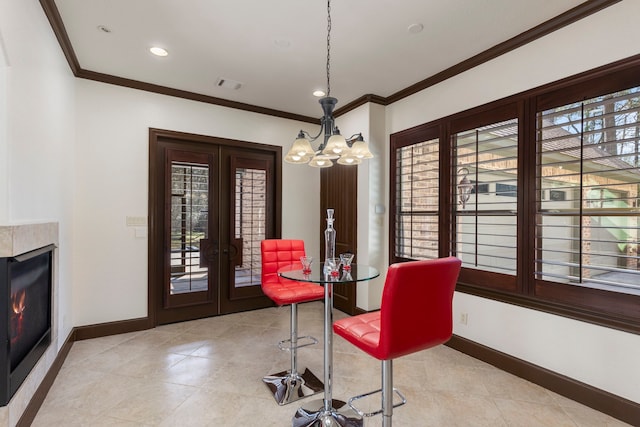 dining area with baseboards, visible vents, a wealth of natural light, and ornamental molding