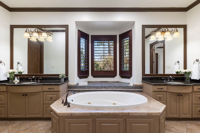 bathroom with a jetted tub, a sink, and crown molding