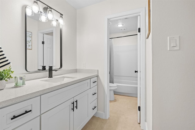 bathroom with shower / tub combo, vanity, and toilet