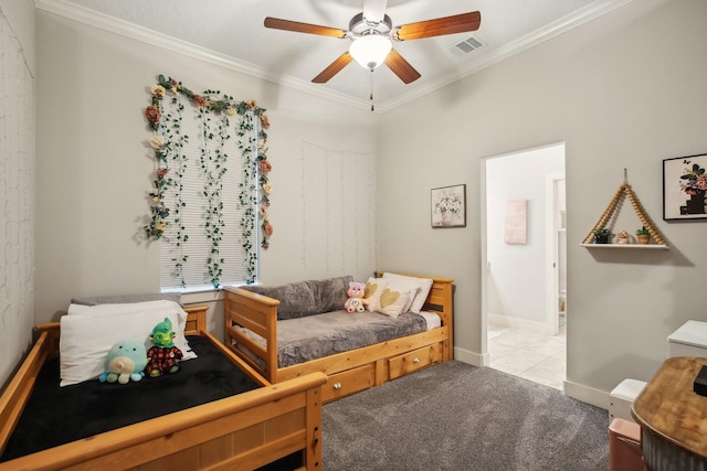 bedroom featuring light carpet, baseboards, visible vents, a ceiling fan, and crown molding