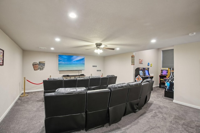 carpeted home theater room with baseboards, ceiling fan, and recessed lighting