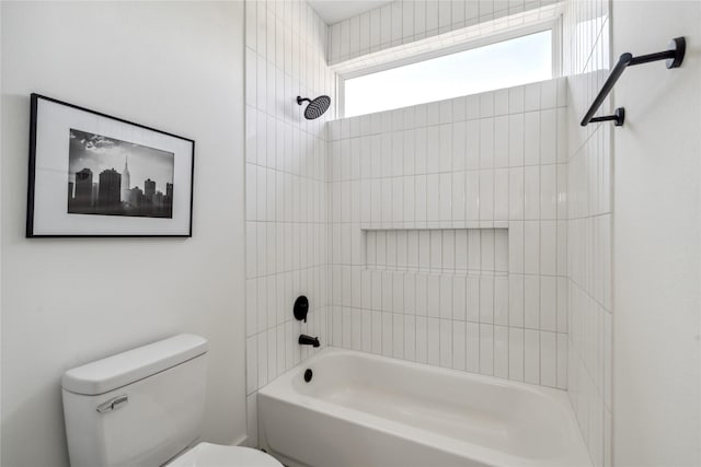 bathroom with shower / washtub combination and toilet