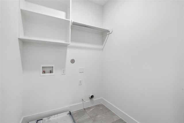 laundry room featuring hookup for a gas dryer, laundry area, washer hookup, and baseboards