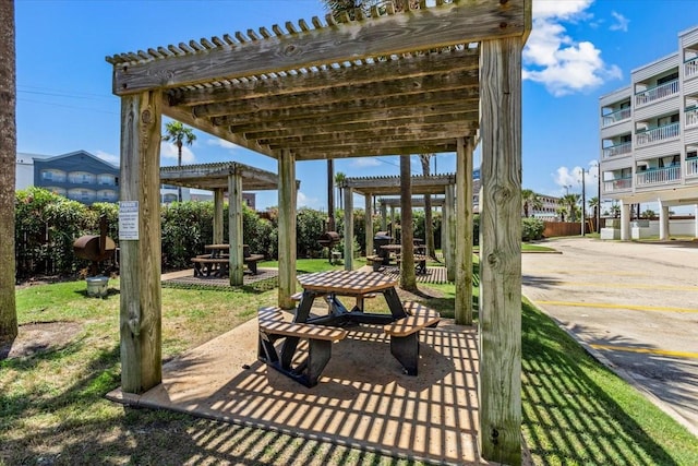 view of home's community featuring a pergola