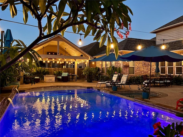 view of pool with fence, a fenced in pool, and a patio