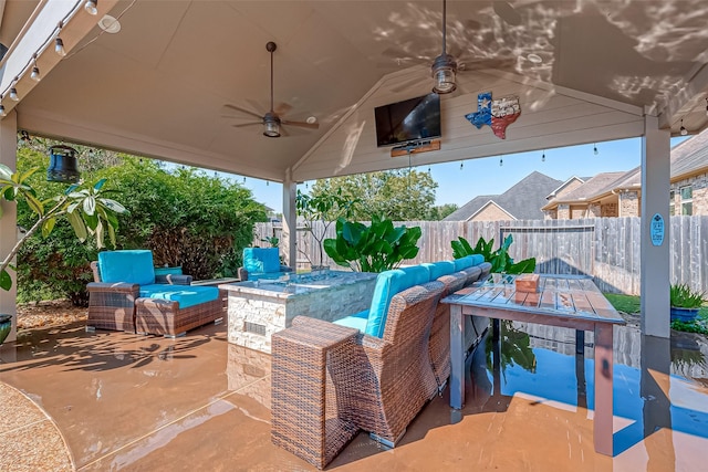 view of patio featuring ceiling fan, outdoor dining area, a fenced backyard, and an outdoor living space