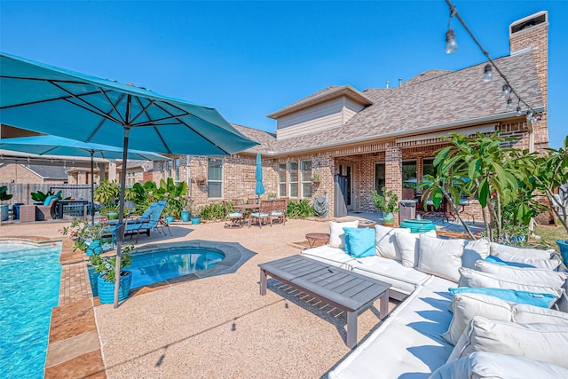 pool with a patio area, outdoor dining space, outdoor lounge area, and fence