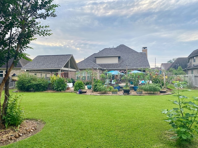 view of yard with fence