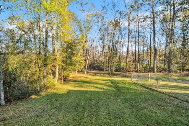 view of yard featuring fence