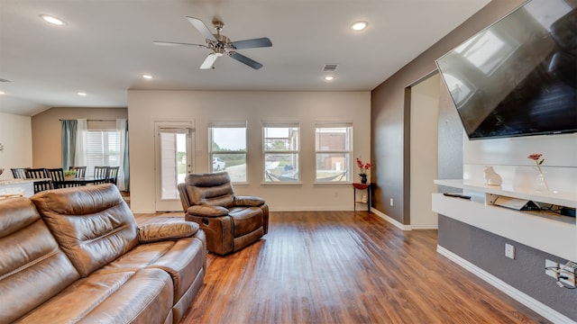 living area featuring baseboards, visible vents, a ceiling fan, wood finished floors, and recessed lighting